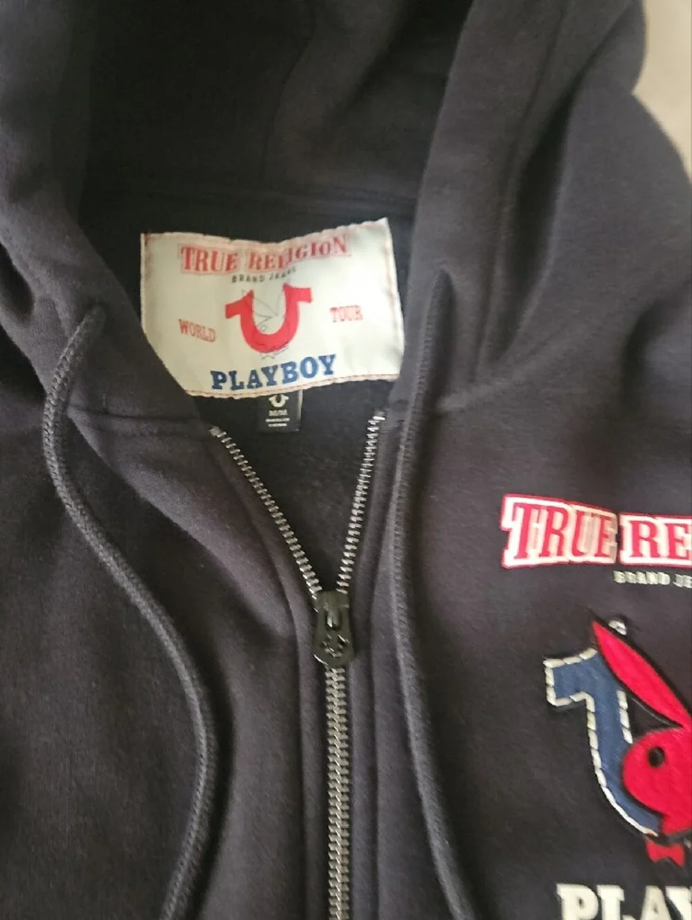 True Religion Black Zip-Up Hoodie with Iconic Blue & Red Bunnie Logo